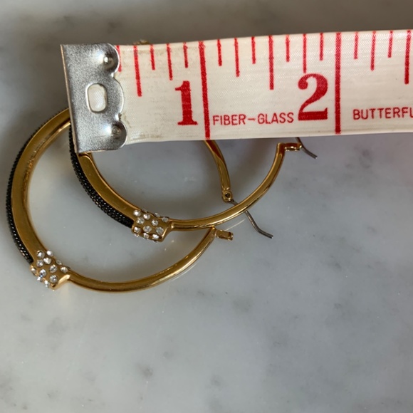 Sparkly 1 3/4 inch hoops in gold-tone with black metal & crystals. - Picture 9 of 9